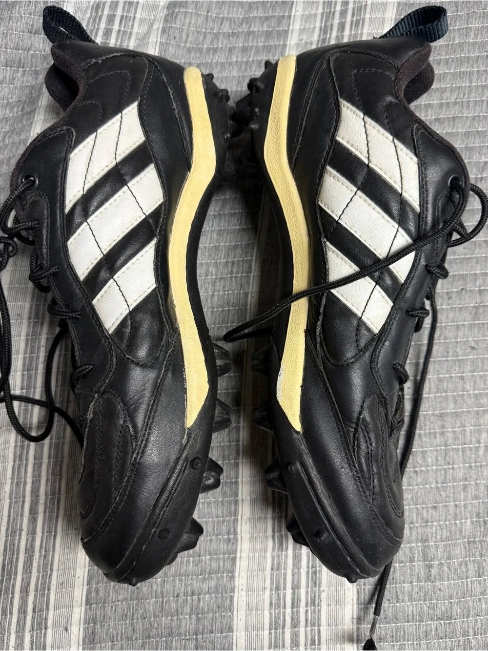 adidas Black Athletic Football Cleats with White Stripes